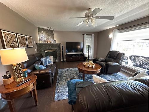 13379 Township Road #318 John'S Drive, Lac La Biche, AB - Indoor Photo Showing Living Room With Fireplace