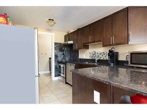 152 Snowy Owl Way, Fort Mcmurray, AB - Indoor Photo Showing Kitchen With Double Sink