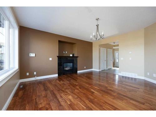 152 Snowy Owl Way, Fort Mcmurray, AB - Indoor With Fireplace