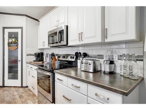 785 Beacon Hill Drive, Fort Mcmurray, AB - Indoor Photo Showing Kitchen