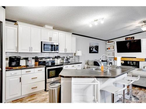 785 Beacon Hill Drive, Fort Mcmurray, AB - Indoor Photo Showing Kitchen With Stainless Steel Kitchen With Double Sink