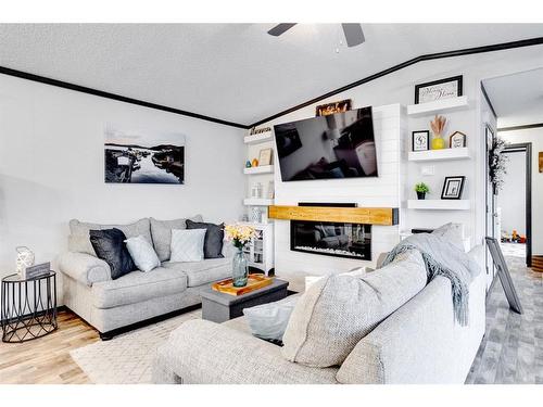 785 Beacon Hill Drive, Fort Mcmurray, AB - Indoor Photo Showing Living Room With Fireplace