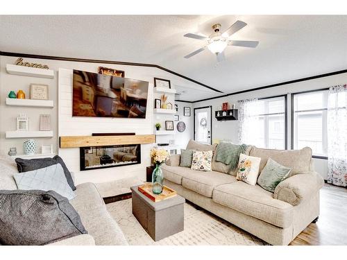 785 Beacon Hill Drive, Fort Mcmurray, AB - Indoor Photo Showing Living Room With Fireplace