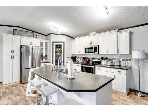 785 Beacon Hill Drive, Fort Mcmurray, AB - Indoor Photo Showing Kitchen With Stainless Steel Kitchen With Double Sink