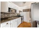 197 Ross Haven Drive, Fort Mcmurray, AB  - Indoor Photo Showing Kitchen With Stainless Steel Kitchen With Double Sink With Upgraded Kitchen 