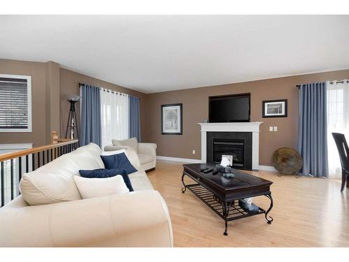 101 Trillium Road, Fort Mcmurray, AB - Indoor Photo Showing Living Room With Fireplace