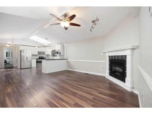 132 Gregoire Crescent, Fort Mcmurray, AB - Indoor Photo Showing Living Room With Fireplace