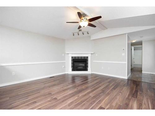 132 Gregoire Crescent, Fort Mcmurray, AB - Indoor Photo Showing Other Room With Fireplace