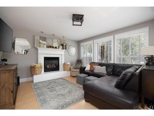 151 Berard Crescent, Fort Mcmurray, AB - Indoor Photo Showing Living Room With Fireplace