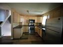 101 Bird Crescent, Fort Mcmurray, AB  - Indoor Photo Showing Kitchen With Double Sink 