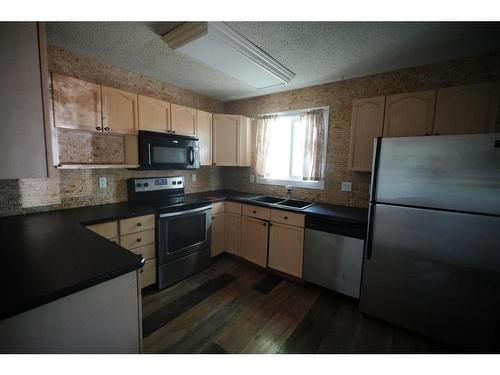 101 Bird Crescent, Fort Mcmurray, AB - Indoor Photo Showing Kitchen With Double Sink