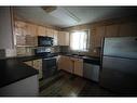 101 Bird Crescent, Fort Mcmurray, AB  - Indoor Photo Showing Kitchen With Double Sink 