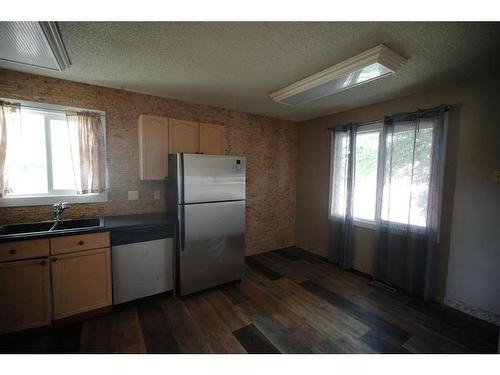 101 Bird Crescent, Fort Mcmurray, AB - Indoor Photo Showing Kitchen With Double Sink