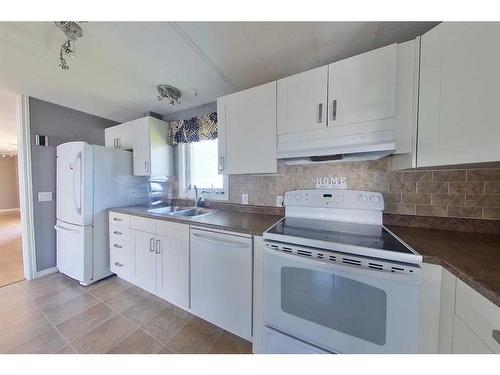 112 Caouette Crescent, Fort Mcmurray, AB - Indoor Photo Showing Kitchen With Double Sink