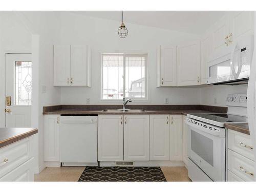 152 Webb Drive, Fort Mcmurray, AB - Indoor Photo Showing Kitchen With Double Sink