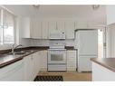 152 Webb Drive, Fort Mcmurray, AB  - Indoor Photo Showing Kitchen With Double Sink 