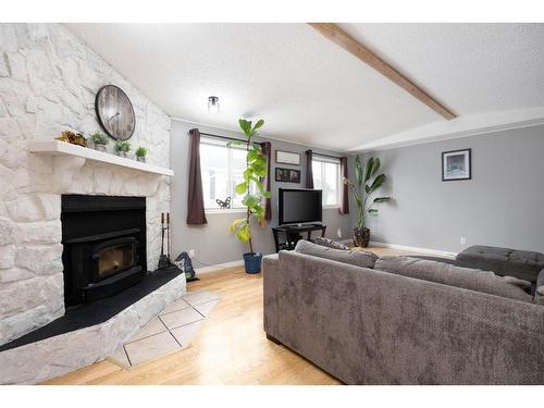 176 Cokerill Crescent, Fort Mcmurray, AB - Indoor Photo Showing Living Room With Fireplace