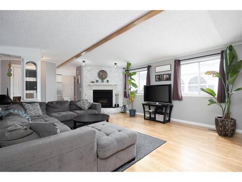 176 Cokerill Crescent, Fort Mcmurray, AB - Indoor Photo Showing Living Room With Fireplace