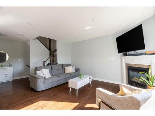 32-193 O'Coffey Crescent, Fort Mcmurray, AB - Indoor Photo Showing Living Room With Fireplace