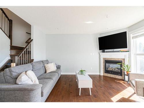 32-193 O'Coffey Crescent, Fort Mcmurray, AB - Indoor Photo Showing Living Room With Fireplace