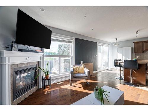 32-193 O'Coffey Crescent, Fort Mcmurray, AB - Indoor Photo Showing Living Room With Fireplace