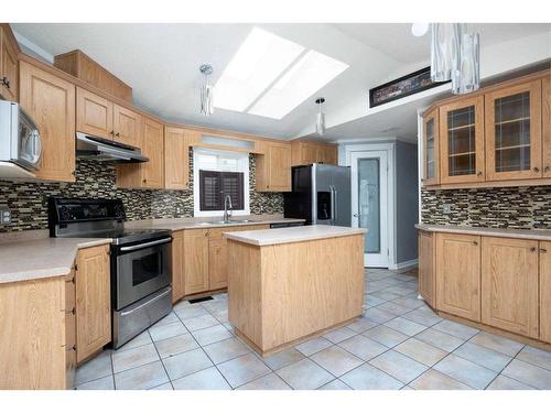 389 Mckinlay Crescent, Fort Mcmurray, AB - Indoor Photo Showing Kitchen With Double Sink