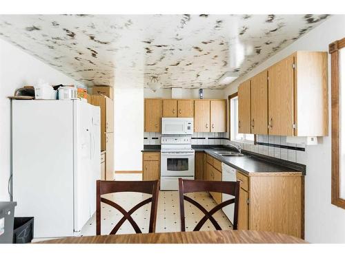 61 Alberta Drive, Fort Mcmurray, AB - Indoor Photo Showing Kitchen With Double Sink