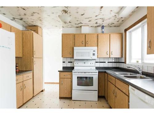 61 Alberta Drive, Fort Mcmurray, AB - Indoor Photo Showing Kitchen With Double Sink