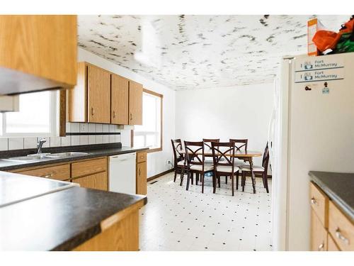 61 Alberta Drive, Fort Mcmurray, AB - Indoor Photo Showing Kitchen With Double Sink