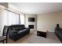 332-201 Abasand Drive, Fort Mcmurray, AB  - Indoor Photo Showing Living Room With Fireplace 