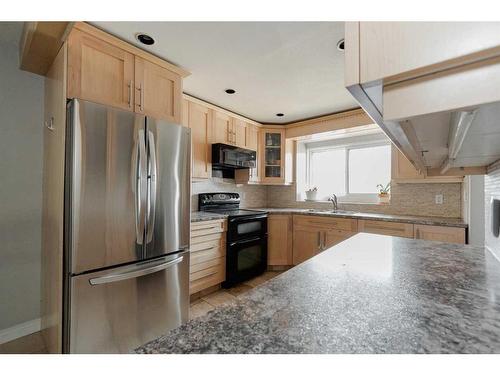 105 Graham Place, Fort Mcmurray, AB - Indoor Photo Showing Kitchen With Stainless Steel Kitchen