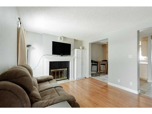 105 Graham Place, Fort Mcmurray, AB - Indoor Photo Showing Living Room With Fireplace