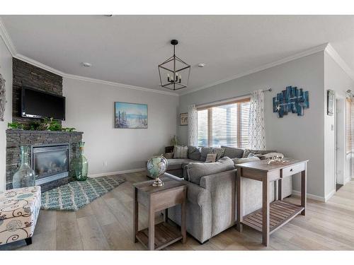 113 Pliska Crescent, Fort Mcmurray, AB - Indoor Photo Showing Living Room With Fireplace