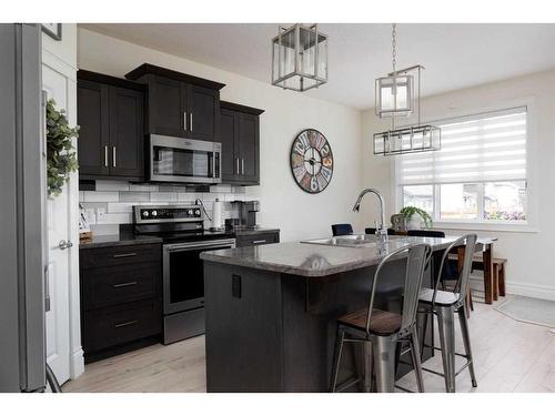 135 Arncliff Court, Fort Mcmurray, AB - Indoor Photo Showing Kitchen With Stainless Steel Kitchen With Upgraded Kitchen