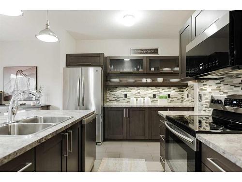 18-300 Sparrow Hawk Drive, Fort Mcmurray, AB - Indoor Photo Showing Kitchen With Double Sink With Upgraded Kitchen