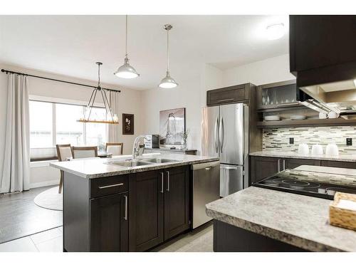 18-300 Sparrow Hawk Drive, Fort Mcmurray, AB - Indoor Photo Showing Kitchen With Double Sink With Upgraded Kitchen