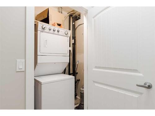 18-300 Sparrow Hawk Drive, Fort Mcmurray, AB - Indoor Photo Showing Laundry Room