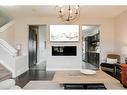 18-300 Sparrow Hawk Drive, Fort Mcmurray, AB  - Indoor Photo Showing Living Room With Fireplace 