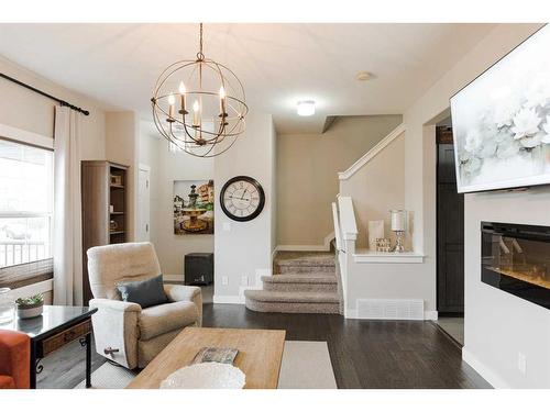 18-300 Sparrow Hawk Drive, Fort Mcmurray, AB - Indoor Photo Showing Living Room With Fireplace