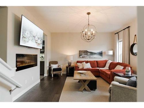 18-300 Sparrow Hawk Drive, Fort Mcmurray, AB - Indoor Photo Showing Living Room With Fireplace