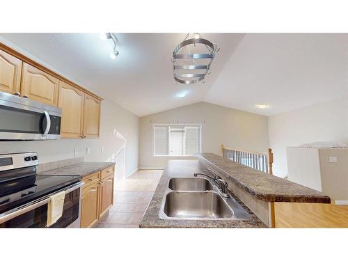 108 Fox Crescent, Fort Mcmurray, AB - Indoor Photo Showing Kitchen With Double Sink