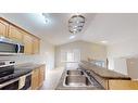 108 Fox Crescent, Fort Mcmurray, AB  - Indoor Photo Showing Kitchen With Double Sink 