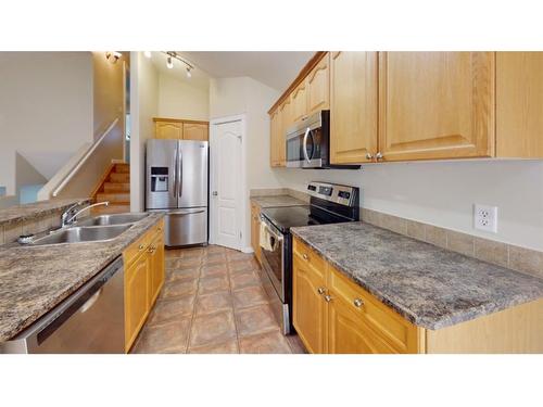 108 Fox Crescent, Fort Mcmurray, AB - Indoor Photo Showing Kitchen With Double Sink