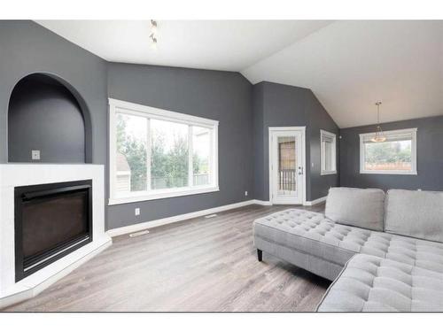 157 Pickles Crescent, Fort Mcmurray, AB - Indoor Photo Showing Living Room With Fireplace