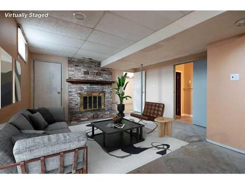 108 Piven Place, Fort Mcmurray, AB - Indoor Photo Showing Living Room With Fireplace