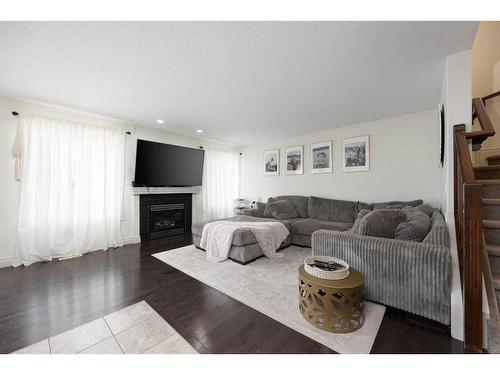 244 Gravelstone Road, Fort Mcmurray, AB - Indoor Photo Showing Living Room With Fireplace