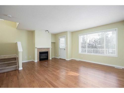 1-240 Laffont Way, Fort Mcmurray, AB - Indoor Photo Showing Living Room With Fireplace