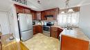 381 Greenwich Lane, Fort Mcmurray, AB  - Indoor Photo Showing Kitchen With Stainless Steel Kitchen With Double Sink 