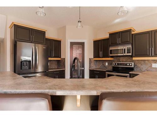 216 Pinnacle Place, Fort Mcmurray, AB - Indoor Photo Showing Kitchen With Upgraded Kitchen