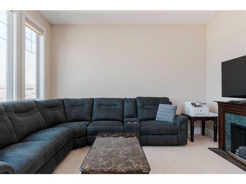 216 Pinnacle Place, Fort Mcmurray, AB - Indoor Photo Showing Living Room With Fireplace